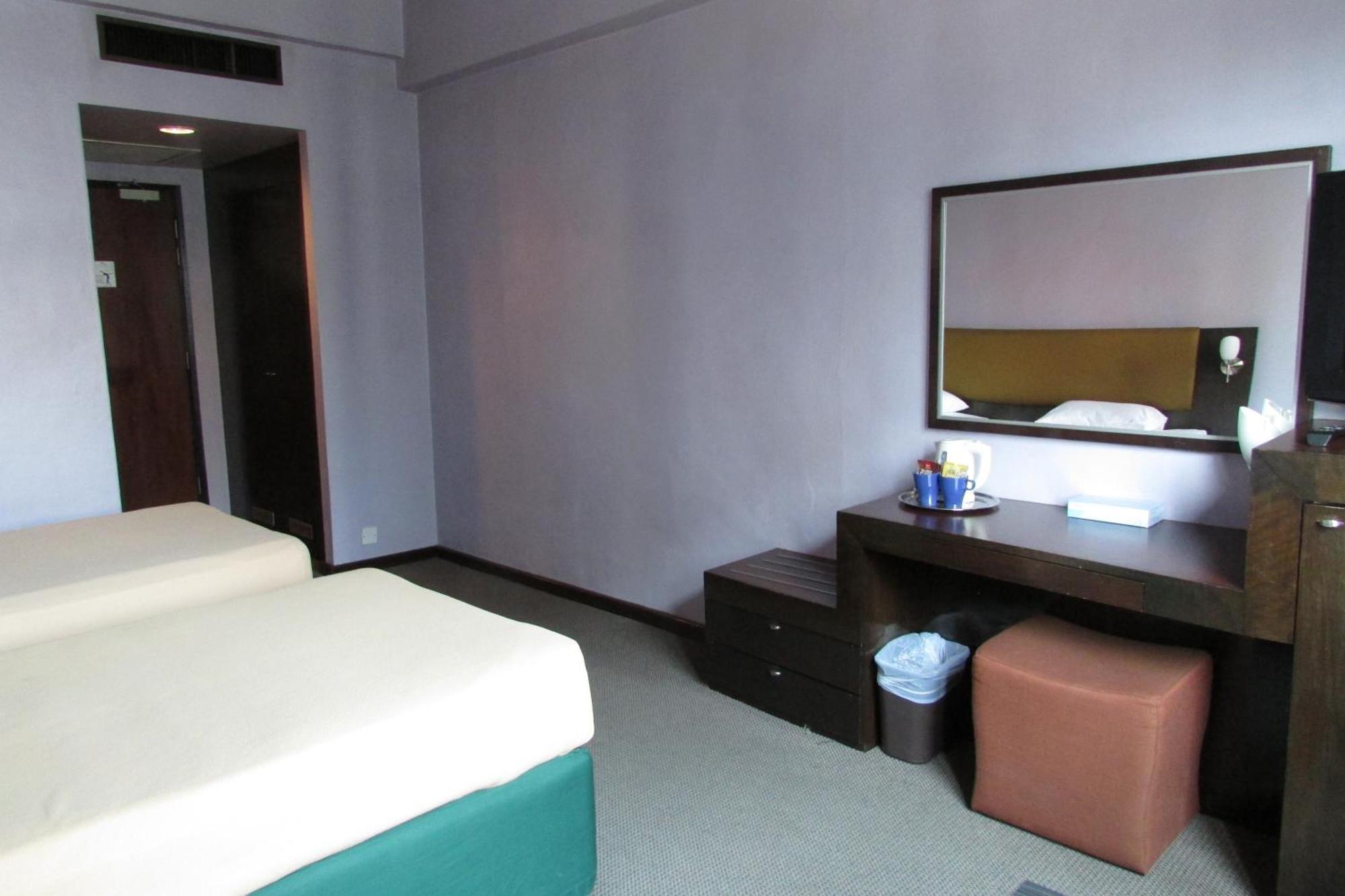 Strand Hotel Singapur Habitación foto