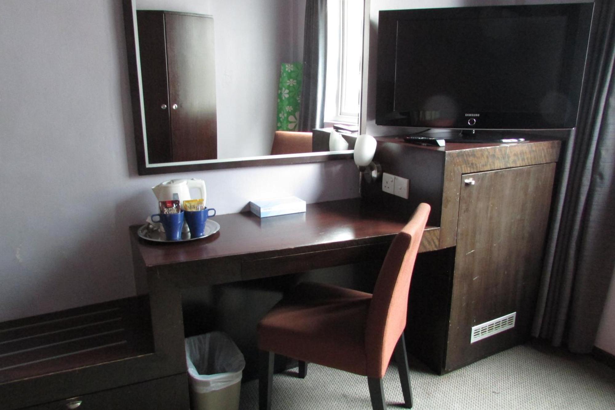 Strand Hotel Singapur Habitación foto